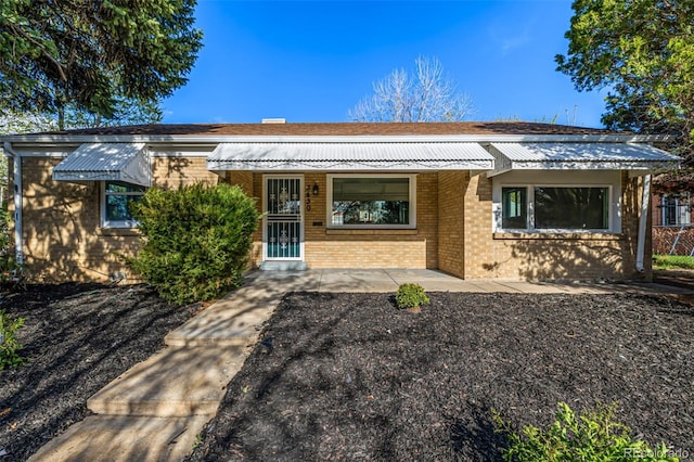 view of front of property with brick siding