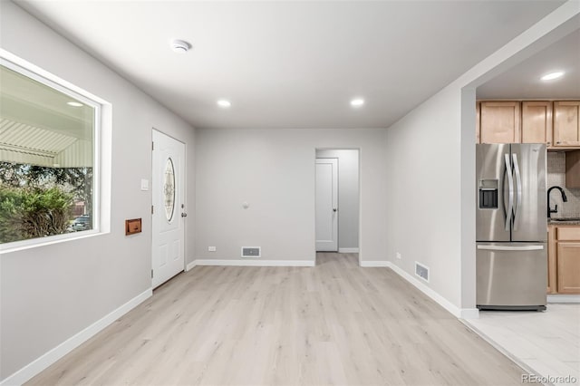 interior space with visible vents, recessed lighting, and light wood-style floors