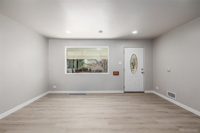 entryway featuring recessed lighting, visible vents, and light wood-style flooring