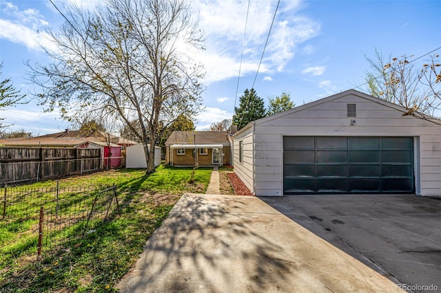 detached garage with fence