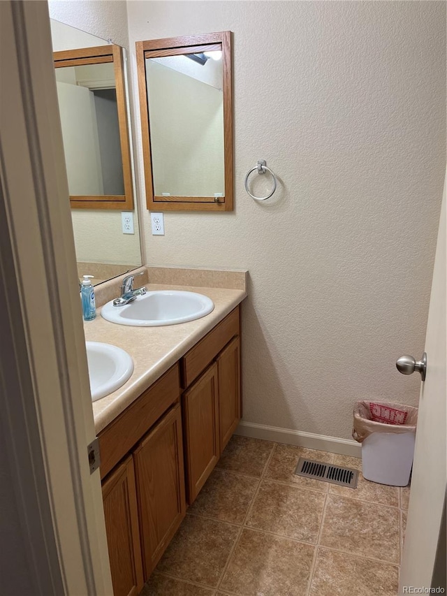 bathroom featuring vanity