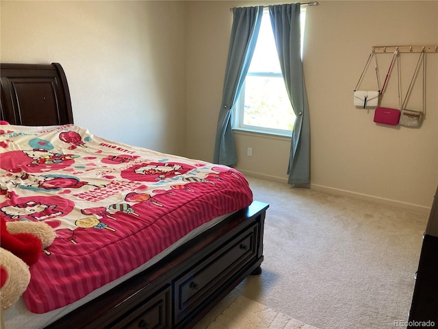 bedroom featuring carpet