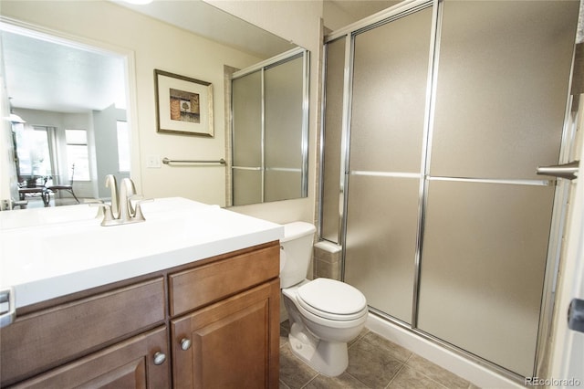 17672 E Weaver Pl, Aurora, CO 80016 - bathroom with vanity, a stall shower, and tile patterned floors