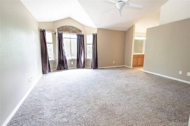17672 E Weaver Pl, Aurora, CO 80016 - unfurnished room with vaulted ceiling, a ceiling fan, and light carpet