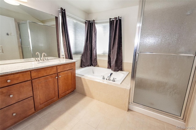 17672 E Weaver Pl, Aurora, CO 80016 - bathroom with a shower stall, vanity, tile patterned floors, and a garden tub