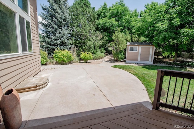17672 E Weaver Pl, Aurora, CO 80016 - view of patio featuring a storage unit and a wooden deck