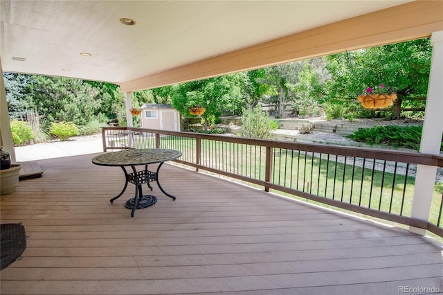 17672 E Weaver Pl, Aurora, CO 80016 - wooden terrace featuring a storage unit