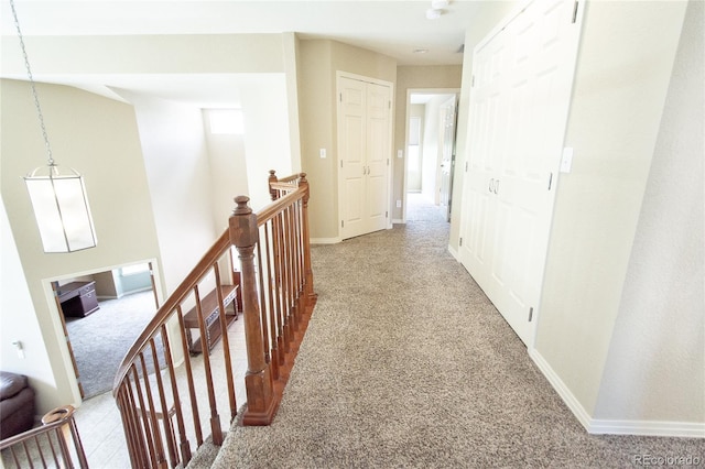 17672 E Weaver Pl, Aurora, CO 80016 - hall featuring carpet flooring and an upstairs landing