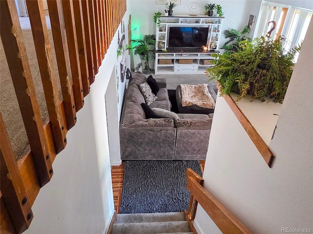 20391 E 42nd Ave, Denver, CO 80249 - living area with stairway and carpet flooring