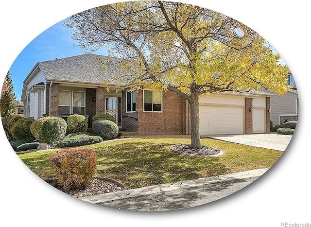 view of front facade featuring a front yard and a garage