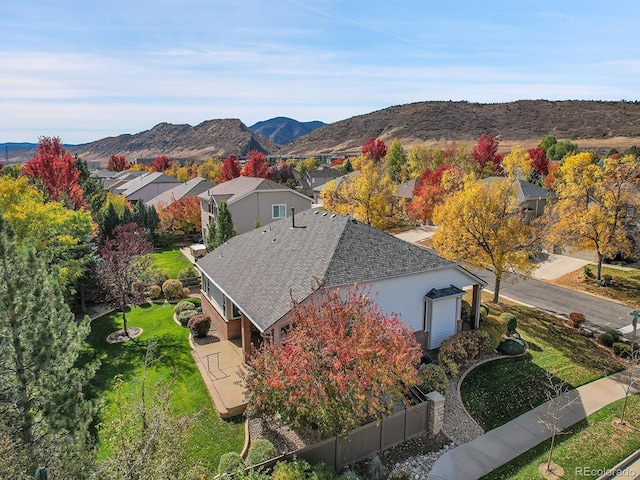 birds eye view of property featuring a mountain view