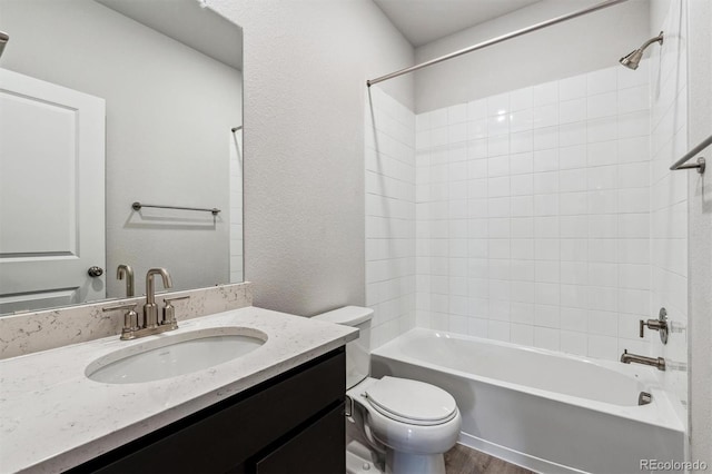 full bathroom featuring bathtub / shower combination, wood-type flooring, vanity, and toilet