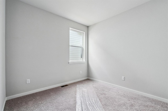 view of carpeted spare room