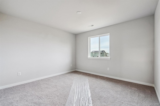 view of carpeted spare room