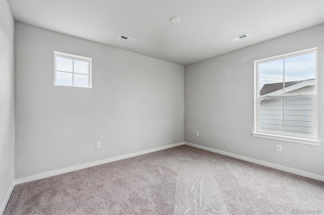 view of carpeted spare room