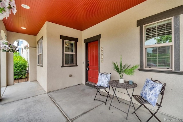 3372 Central Park Blvd, Denver, CO 80238 - entrance to property featuring stucco siding and covered porch