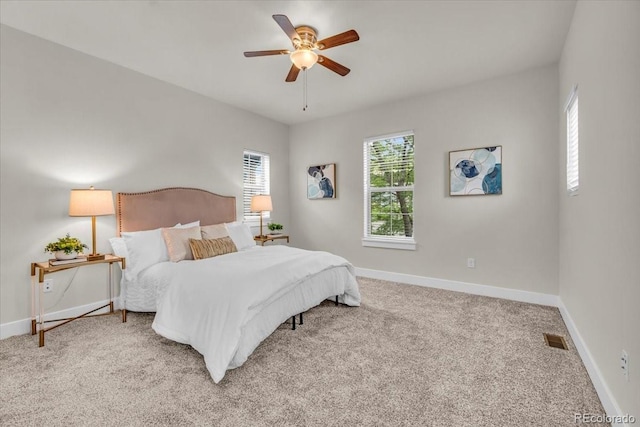 3372 Central Park Blvd, Denver, CO 80238 - bedroom featuring baseboards, carpet flooring, and ceiling fan
