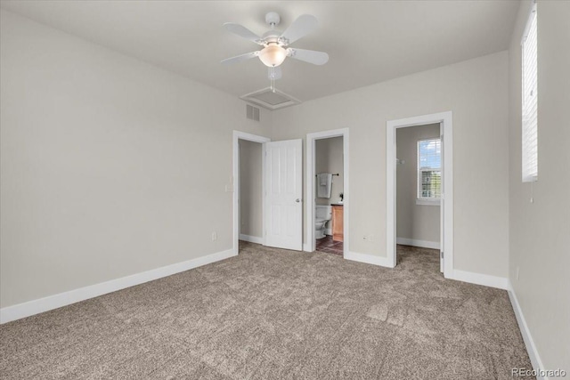 3372 Central Park Blvd, Denver, CO 80238 - unfurnished bedroom featuring carpet floors, baseboards, ensuite bath, and a ceiling fan