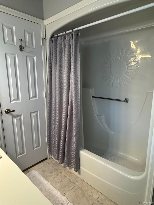 12534 E Pacific Cir Unit A, Aurora, CO 80014 - bathroom featuring tile patterned flooring and shower / bath combo