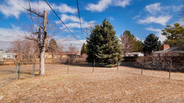 view of yard with fence