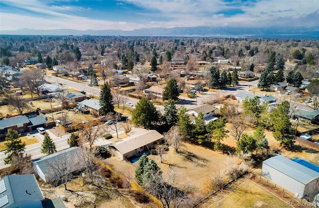 drone / aerial view featuring a mountain view and a residential view