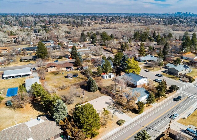 birds eye view of property with a residential view