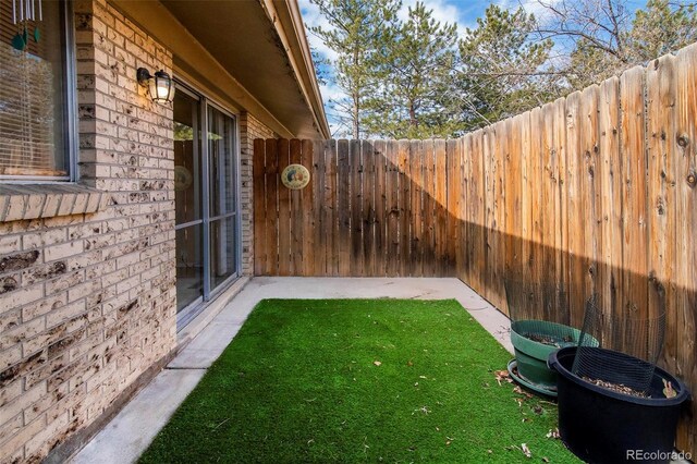 view of yard featuring fence