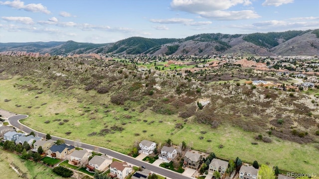 aerial view featuring a mountain view and a residential view