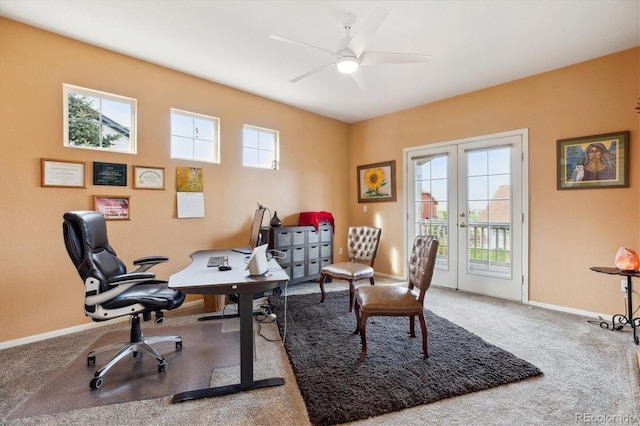 home office featuring carpet, baseboards, french doors, and a ceiling fan