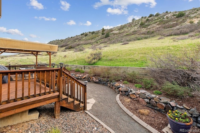wooden terrace with a mountain view