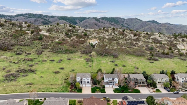 bird's eye view with a residential view and a mountain view