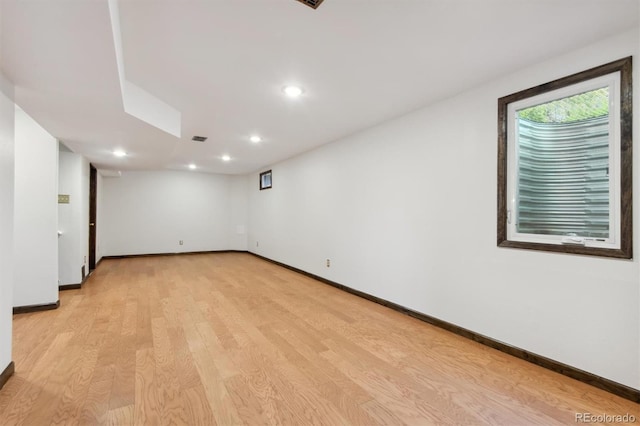 spare room with light wood-type flooring