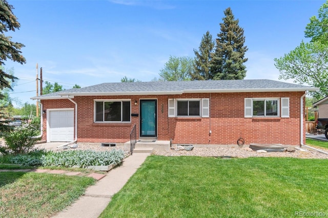ranch-style house featuring an attached garage, a front lawn, brick siding, and a shingled roof