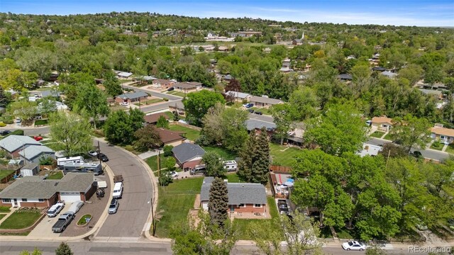 aerial overview of property's location with nearby suburban area