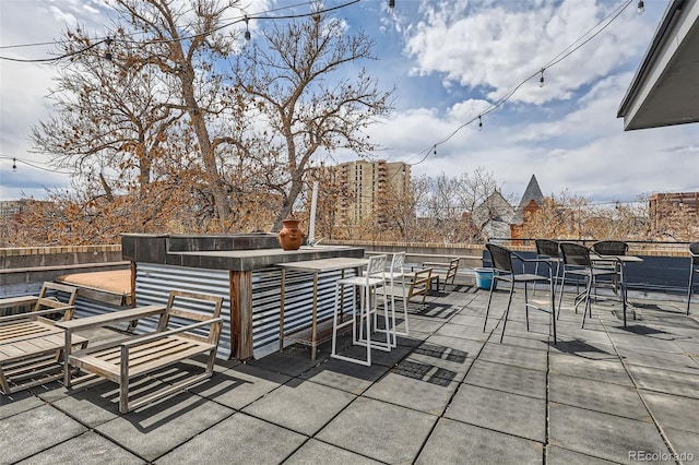 500 E 11th Ave Unit 305, Denver, CO 80203 - view of patio / terrace featuring outdoor dining space