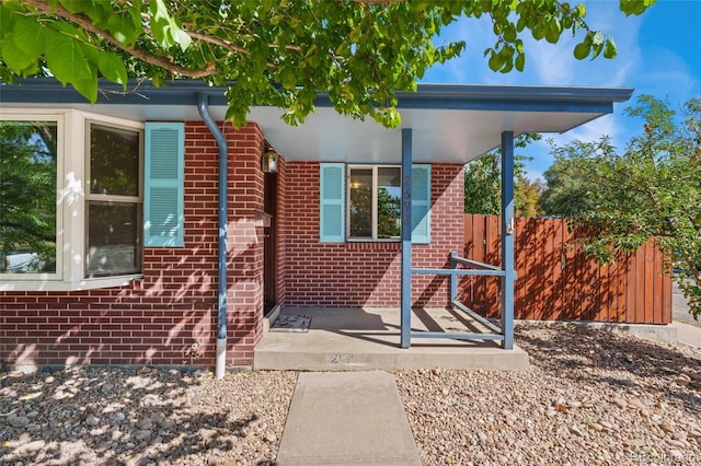 2692 S Pennsylvania St, Denver, CO 80210 - exterior space featuring brick siding and fence