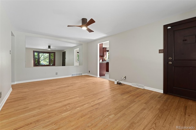 2692 S Pennsylvania St, Denver, CO 80210 - unfurnished room with ceiling fan, visible vents, baseboards, and light wood-style floors