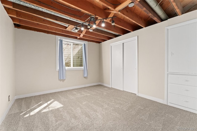 2692 S Pennsylvania St, Denver, CO 80210 - unfurnished bedroom featuring a closet, baseboards, and carpet flooring