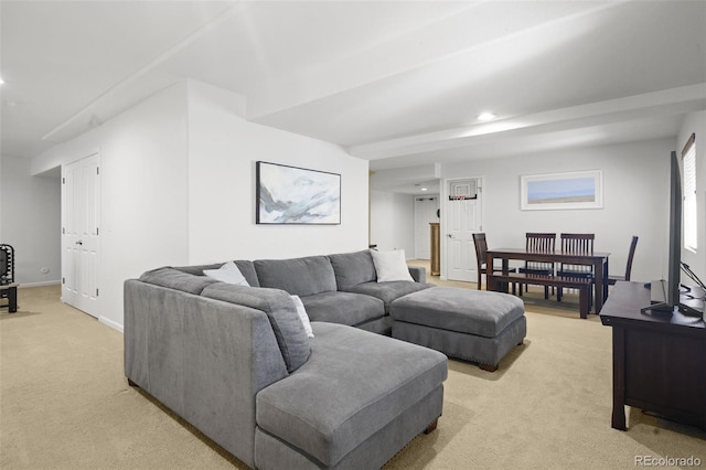 living room with light carpet, recessed lighting, and baseboards