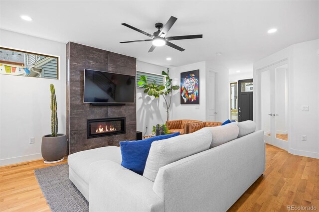 living area with a healthy amount of sunlight and recessed lighting
