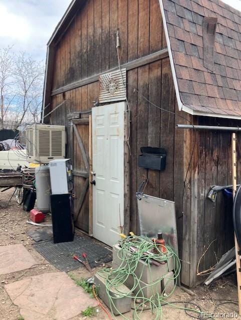 615 E 49th Ave, Denver, CO 80216 - view of barn featuring central air condition unit
