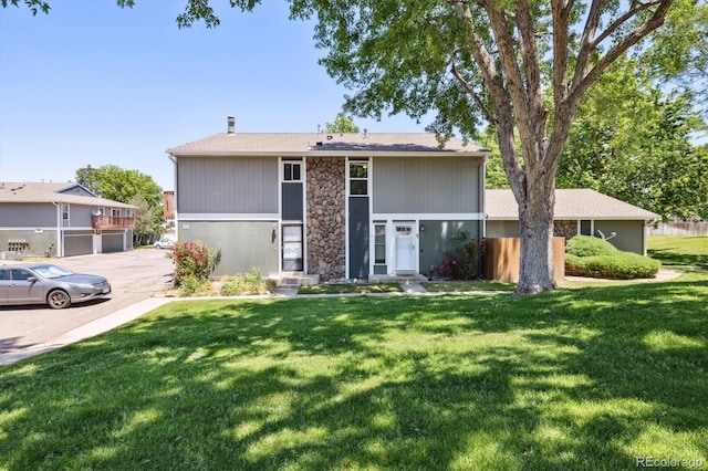 view of front of property with a front lawn