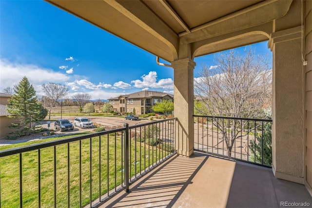 balcony featuring a residential view