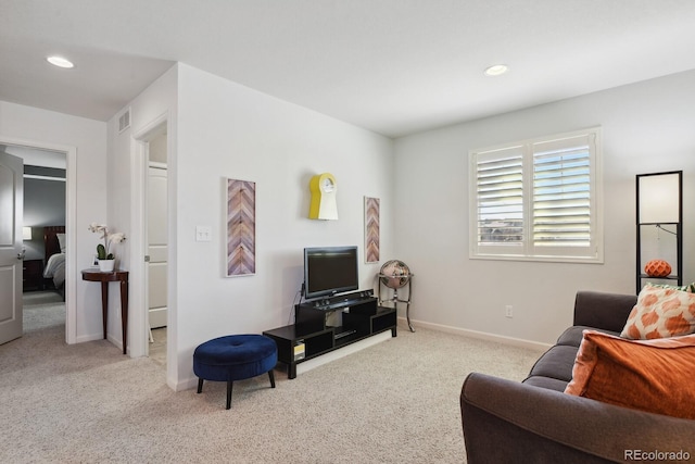 living room with light colored carpet