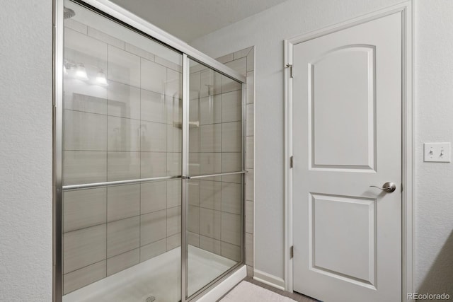 bathroom with an enclosed shower