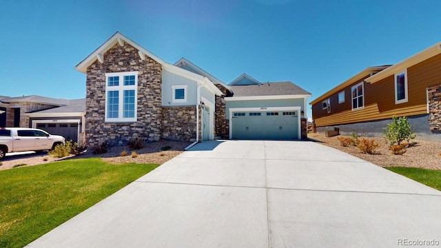 view of front facade with a front lawn and a garage