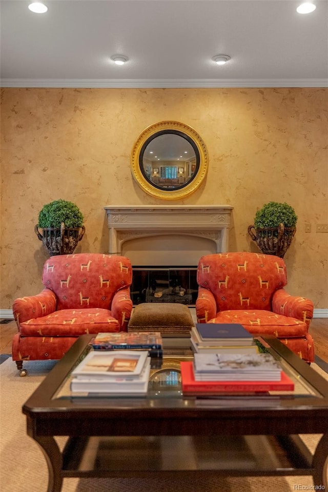 living area with crown molding