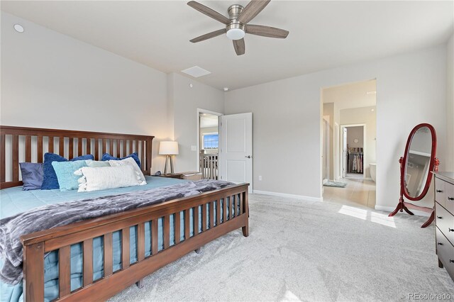 bedroom with light carpet and ceiling fan