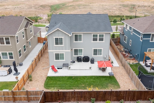 back of house featuring cooling unit and a patio area