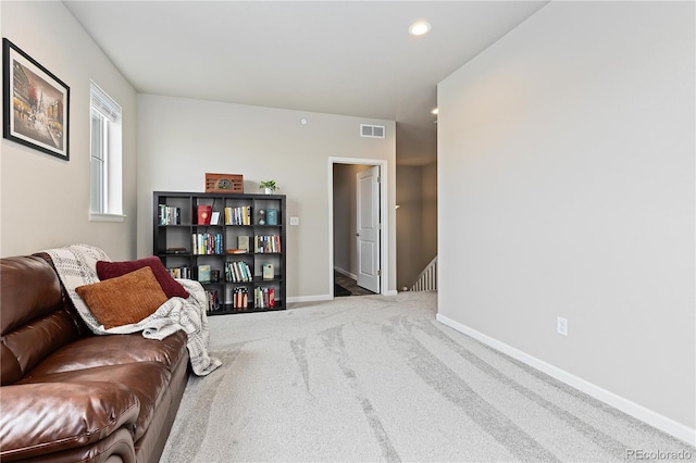 sitting room featuring carpet